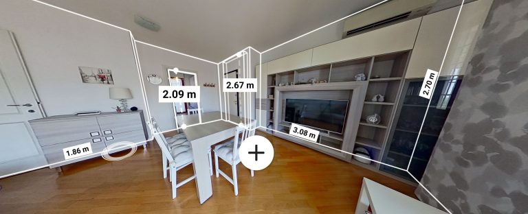 Visite virtuelle 3D immobilier d’un salon avec mesures précises des murs et du mobilier